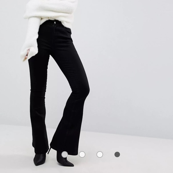 ASOS DESIGN Petite Bell Flare Jeans in Clean Black with Pressed Crease - Picture 3 of 7
